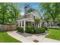 Side angle view of home showing paved driveway and manicured lawn at 183 Whitefoord Ne Ave, Atlanta, GA 30307