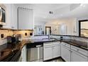Bright kitchen with stainless steel appliances, subway tile backsplash, and a breakfast bar at 1250 Parkwood Se Cir # 3001, Atlanta, GA 30339