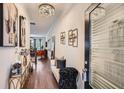 Inviting foyer with hardwood floors, stylish decor, and a view into the home's living spaces at 2543 Oakbourne Ln # 14, Smyrna, GA 30080