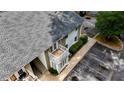 An apartment building with a charming balcony, ample parking and easy access to the apartments at 1212 Utoy Springs Rd # 46, Atlanta, GA 30331