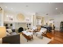 Spacious living room with hardwood floors and decorative fireplace with built-in shelving at 101 Terrace Dr, Atlanta, GA 30305