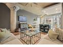 Spacious living room showcasing modern decor, a large window, a comfortable sofa, and an open layout at 890 Memorial Se Dr # 102, Atlanta, GA 30316