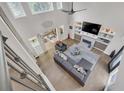 An impressive two-story living room with large windows, modern furnishings, and bright atmosphere at 1420 Cortez Ne Ln, Atlanta, GA 30319