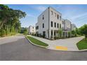 Stylish townhome showcases modern design, lush landscaping, and convenient sidewalk access at 2144 Tidwell Ln # 2, Atlanta, GA 30318
