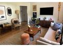 Comfortable living space with a sofa, armchairs, wooden accents, and stylish decor at 1038 Ralph Ne Rd, Atlanta, GA 30324