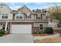 Inviting two-story home with a two-car garage, manicured lawn, and a cozy feel at 331 Franklin Ln, Acworth, GA 30102
