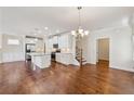 Open-concept kitchen with stainless steel appliances and a center island at 3182 Hartford Mill Pl, Duluth, GA 30097
