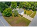 Spacious property featuring a well-maintained lawn and a classic white picket fence at 2584 Gravitt Rd, Duluth, GA 30096