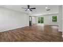 Inviting living space featuring modern flooring, abundant natural light, and an easy access door to the kitchen at 3757 Cindy Dr, Douglasville, GA 30135