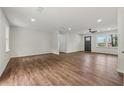 Spacious living area with sleek flooring, recessed lighting, and fresh paint, offering a modern and airy feel at 3757 Cindy Dr, Douglasville, GA 30135