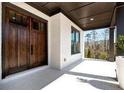 Inviting front porch with stylish double doors and ample space for seating at 320 Dodd Ln, Alpharetta, GA 30005