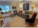 Comfortable living room with a large window seat and hardwood floors at 3119 Colonial Way # H, Atlanta, GA 30341