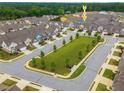 Community aerial view showcasing well-planned streets, green spaces, and consistent architectural design at 2141 Slick Stone Dr, Snellville, GA 30078