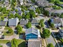 Aerial view showcasing a residential neighborhood with well-maintained homes and tree-lined streets at 1783 Drew Nw Dr, Atlanta, GA 30318