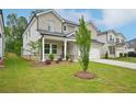 Beautiful exterior with a well-maintained lawn, complemented by fresh landscaping and a welcoming entrance at 3970 Brushy St, Powder Springs, GA 30127