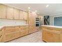 Spacious kitchen featuring custom cabinets, stainless appliances, and a layout perfect for cooking and entertaining at 1349 Mckinsey Rdg, Loganville, GA 30052