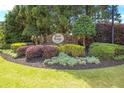 Rose Ridge Estates entrance with manicured landscaping at 240 Rose Ridge Dr, Canton, GA 30115