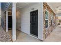 Inviting front entry featuring a black door and elegant stone accents at 2111 Wesson Ct, Kennesaw, GA 30144