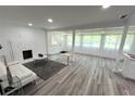 Bright living area with modern flooring, cozy fireplace and comfortable seating at 2346 Pryor Sw Rd, Atlanta, GA 30315