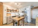 Modern kitchen with stainless steel appliances, wooden accents, and open shelving at 170 Boulevard Se # 521H, Atlanta, GA 30312