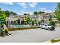 Community pool and amenity center with a nice pool, patio, and outdoor fireplace area at 2187 Elmont Se Way, Smyrna, GA 30080