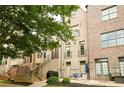 View of the exterior of the townhome featuring a patio with outdoor furniture at 538 Micayne Cir # 3, Smyrna, GA 30082