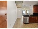 Modern kitchen featuring stainless steel appliances, granite countertops, and stylish cabinetry at 860 Peachtree Ne St # 2209, Atlanta, GA 30308