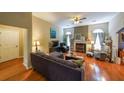 Cozy living room with hardwood floors, neutral colors, and plenty of natural light at 4872 Nature Trl, Austell, GA 30106