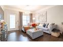 Inviting living room with hardwood floors, plush sofa, and elegant decor throughout at 2700 Pine Tree Ne Rd # 2204, Atlanta, GA 30324