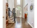 Two-story foyer features hardwood floors, staircase, and great natural light at 12350 Stevens Creek Dr, Alpharetta, GA 30005