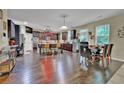 Spacious eat-in kitchen features stainless steel appliances, granite countertops and a large center island at 412 Live Oak Pass, Loganville, GA 30052