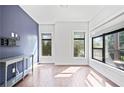 Bright living room featuring hardwood floors and a view of the outdoors at 22 Moda Ln, Atlanta, GA 30316