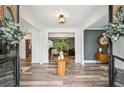Inviting foyer with wood floors, stylish decor, and an open floor plan at 3991 Perry Pass, Lithonia, GA 30038