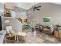 Bright, open-concept living room with soaring ceilings and large windows providing ample natural light at 2735 Royal Blf, Decatur, GA 30030