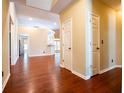 Spacious entryway with hardwood floors leading to the kitchen and living areas at 3082 Monarch Pine Dr, Peachtree Corners, GA 30071