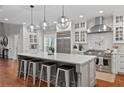 Spacious kitchen featuring a large center island with seating and stainless steel appliances at 18 Starlight Dr, Cartersville, GA 30121