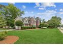 Beautiful home with well-maintained lawn and landscaping at 840 Yosemite Dr, Suwanee, GA 30024
