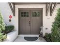 Charming entrance featuring double doors, sidelights, and tasteful decor at 1821 Huntington Hills Nw Ln, Atlanta, GA 30309