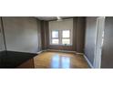 Living space featuring a hardwood floor and windows for natural lighting at 20 Marietta Nw St # 16A, Atlanta, GA 30303
