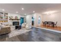 Bright living room featuring a fireplace, built-in shelving, and elegant furnishings at 2221 Meadow Wood Ct, Marietta, GA 30062