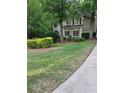 Well-maintained lawn and neatly trimmed bushes in the front yard of this home at 3643 Fowler Rdg, Douglasville, GA 30135