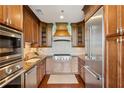 Well-equipped kitchen with stainless steel appliances, custom cabinetry, and granite countertops at 2233 Peachtree Ne Rd # 903, Atlanta, GA 30309
