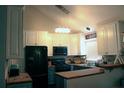Bright kitchen with white cabinets, modern appliances, and butcher block countertops at 1425 Watercrest Cir, Lawrenceville, GA 30043