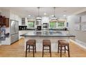Bright kitchen with stainless steel appliances, large island, and modern finishes at 220 N Springs Ct, Sandy Springs, GA 30328