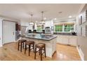 Bright kitchen with stainless steel appliances, large island, and modern finishes at 220 N Springs Ct, Sandy Springs, GA 30328