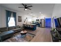 Spacious living room and kitchen area with modern decor and an open floor plan at 3273 Elm St, Atlanta, GA 30337