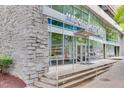 Modern building, Midcity Lofts, has large windows and a stone facade, located at 845 at 845 Spring Nw St # 127, Atlanta, GA 30308