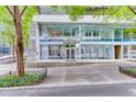 Modern building, Midcity Lofts, has large windows and a stone facade, located at 845 at 845 Spring Nw St # 127, Atlanta, GA 30308