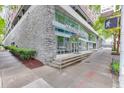 Modern building, Midcity Lofts, has large windows and a stone facade, located at 845 at 845 Spring Nw St # 127, Atlanta, GA 30308
