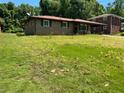 A single-story brick home with a well-maintained lawn and simple landscaping at 4048 Emerald Lake Dr, Decatur, GA 30035